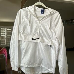 White Nike hooded windbreaker. Size M. Worn once. Classic Nike. Black swoosh.